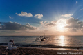 "Prayers at the sea"

Hindu priest bringing his early morning offerings and prayers at Sanur beach, Bali. 