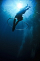 Freediving through the bubble rings . Taken in Coron using a Nikon d300. Freediver: Mj Paula .