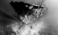 Freediving one of the many wrecks in Coron Bay . Photo taken on breath hold with a Nikon D300 . Freediver : MJ Paula .