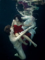 Ship wrecked in Red.  pool with Ballet Dancers