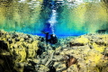 Land of fire and ice/ A diver exploring Iceland's incredible underwater scenery.