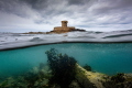 Just got my new housing and was desperate to try it even thought there was a major storm blowing. So I found a huge tidal Rockpool sheltered by the tower. I had to say alert as the massive tides in the Channel Islands meant surf would soon smash over
