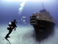 Diving the Tug Boat Rozi at Cirkewwa Divesite, Malta. Clear water visibility on most days of the year, little currents.
