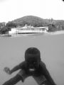 A young BVI Belonger plays underwater for the camera shot with Canon G1 with Inon wide lens natural light