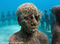Sculpture of Grenadian boy, by Jason deCaires Taylor. After 12 months underwater.