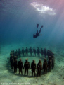 Divemaster Gary, free dives down to the vicissitudes statue installation.  Sculptures by Jason deCaires Taylor