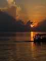 Quiet sunset with the distant sound of boat engine, shadow of it against the setting sun. a dream. Canon G5