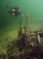 Diving in moutain lake Grundlsee in Austria. 