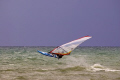 Windsurfer off beach of Kota Kinabalu, Sabah, Malaysia