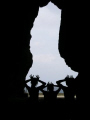 This photo was taken in Orchis Island located at the east sids of Taiwan. In the land tour after dives, we found a sea-erosion hole, a good place for silhouette. Then 3 cute girls stood together, put their hands on their heads, then we can see 3 eyes