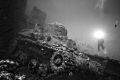 Diver shooting Tank in Truk Lagoon