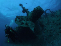 Diver next to the port side prop of the Salem Express. Taken with a Fuji e900 compact camera in an Ikelite housing and Inon UFL-165AD fisheye lens, using natural light.