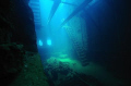 Engine room of Fujikawa Maru around mid-day with natural light streaming down from above