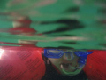 Over/under shot of four year-old Jake on his first snorkel!