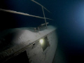 Lediwrack 28.02.2010
Old wreck in the lake of Walensee in Switzerland (35m). I used the Sea&Sea 1G with two extern flashs. I put a torch in the inside of the wreck, looks like some one is in there! :-)