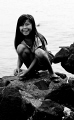 This young Indonesian girl was busy catching small fish, and cleaning them down by the waters edge, without a care in the world, who needs a GameBoy?
