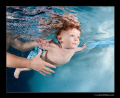 My 16 month son swimming underwater and holding his breath.