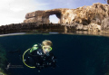 Diver in the Blue Hole, Maltese Islands (on Gozo), with the Azure Window in the Background. One of the last pictures of the Trip... taken first week of June 2011, Nikon D200, Tokina 10-17, Inon Z240s