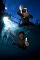 Kids playing on the stern of the boat, dive down during safety stops, and love getting their picture taken