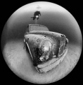 Wraysbury Lake's London Taxi Cab and Diver, taken with a Sigma Circular fish eye. Black & white conversion