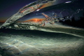disturbance in a tide pool at sunset