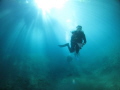 Parting the Rays - Blue Hole Santo Vanuatu. Taken with Canon s95 with Fix Fishweye Lens and single Inon D2000 strobe.