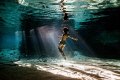 Grand Cenote 374
Woman inside Grand Cenote in Tulum, Quintana Roo, receiving the last rays of sun. Inspiring image transmitting the awe that this magnificent natural wonder produce on our souls...it`s crystal clear freshwater!