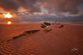 Sunset over a shipwreck