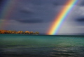 This is a Rainbow over Torch Lake, in Michigan. The fall colors make the pic even better.