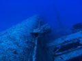 USS Emmons at 140ft. off the coast of Okinawa, with one of its 5