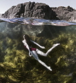 A wild seascape over/under my partner and I shot using my homemade 18